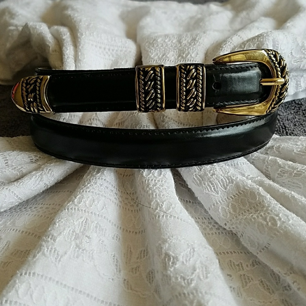 Black leather belt with gold buckle